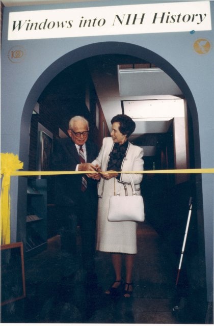 Dr. and Mrs. DeWitt Stetten cutting ribbon to Windows into NIH History